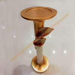 Candle Holders in Wood n leaf Motif.